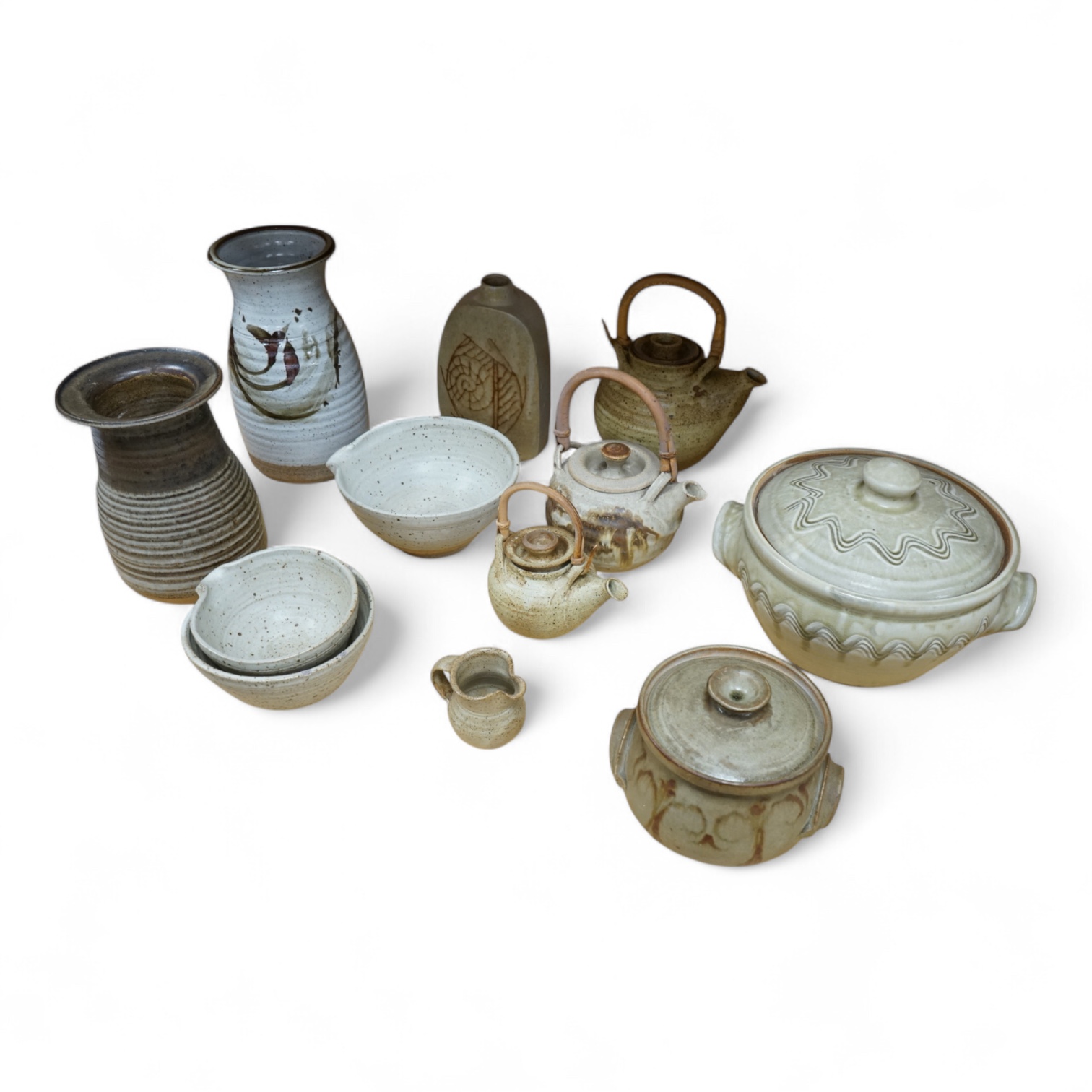 A collection of large Studio pottery vases teapots bowls and tureens (12). Tallest 27cm high